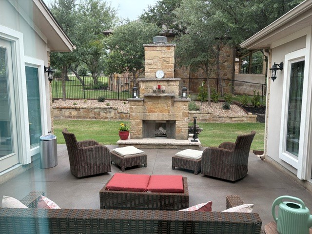 1000 Jonathan Cove Georgetown, TX 78628 - Photo 34 of 40 Beautiful additional private patio w/ outdoor fireplace