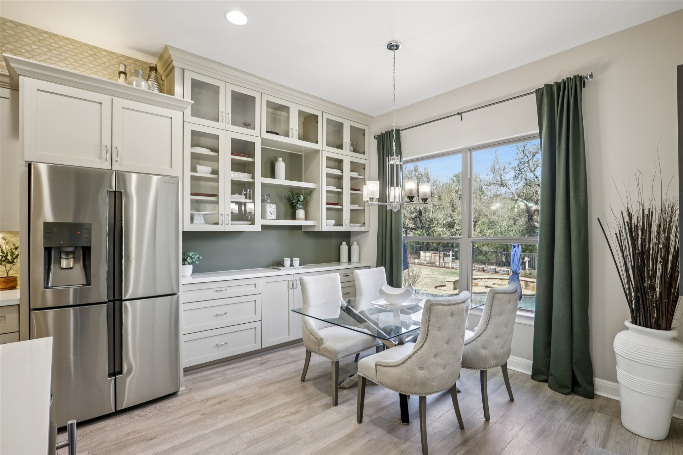 1000 Jonathan Cove Georgetown, TX 78628 - Photo 5 of 40 Kitchen breakfast area w/ gorgeous glass display cabinets