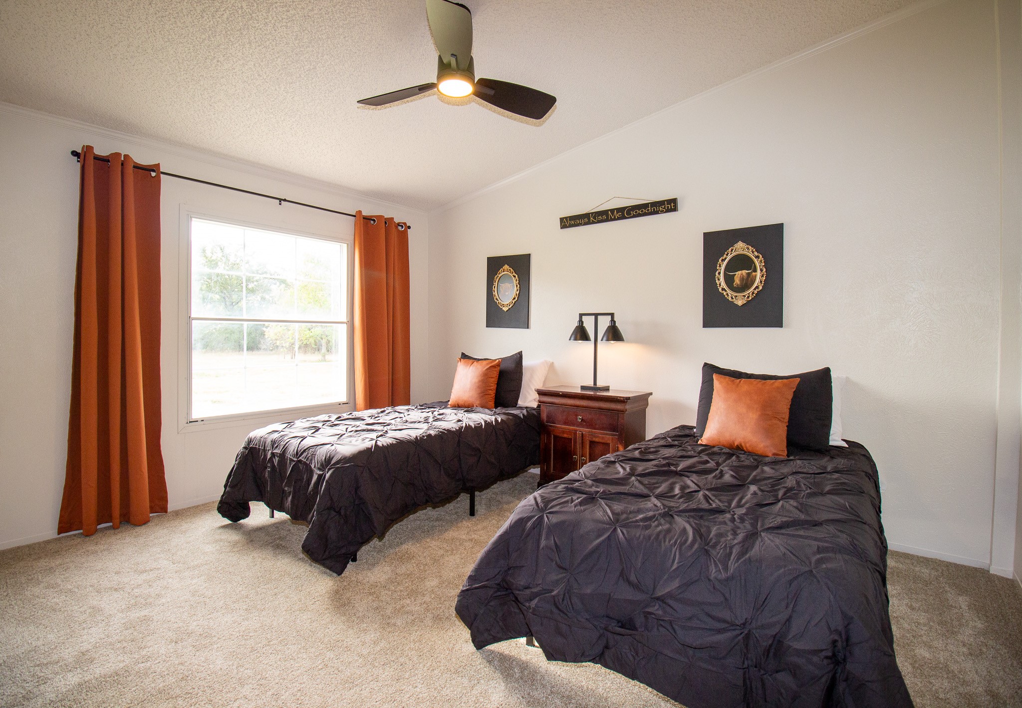 42857 Henson Road Hempstead, TX 77445 - Photo 11 of 18 a bedroom with two beds and a window