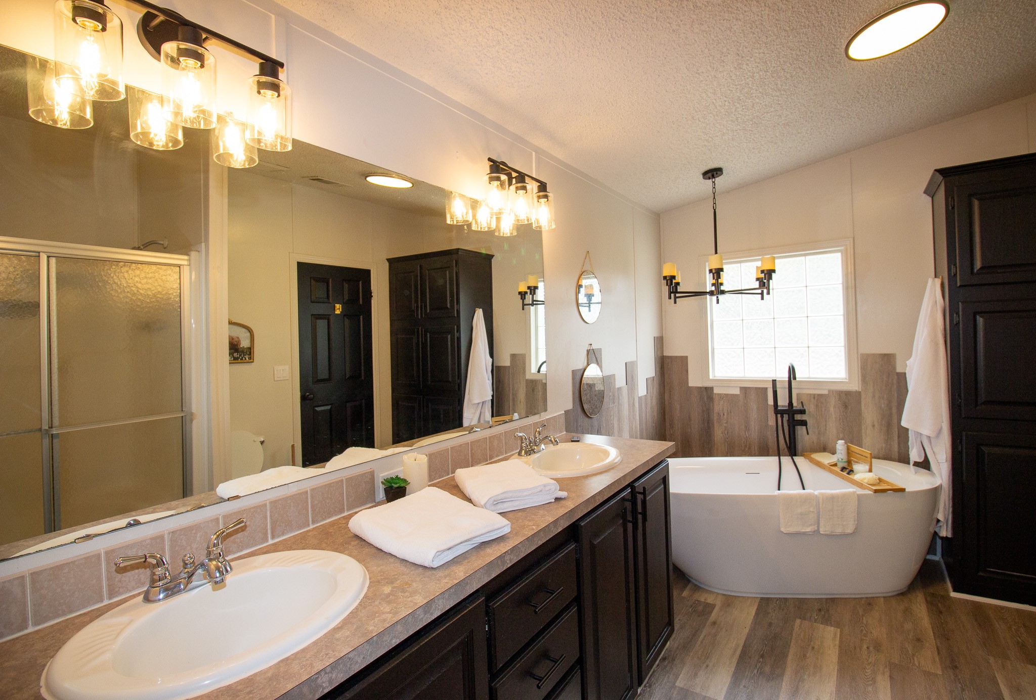 42857 Henson Road Hempstead, TX 77445 - Photo 16 of 20 a bathroom with a double vanity sink and a mirror
