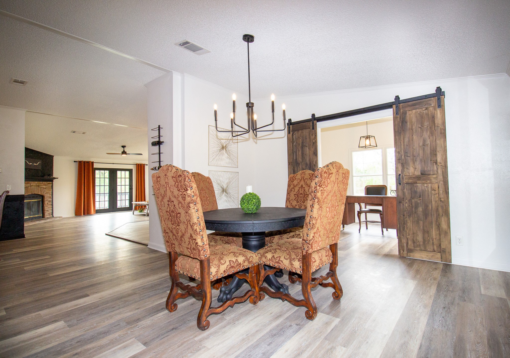 42857 Henson Road Hempstead, TX 77445 - Photo 3 of 18 a view of a dining room with furniture window and wooden floor