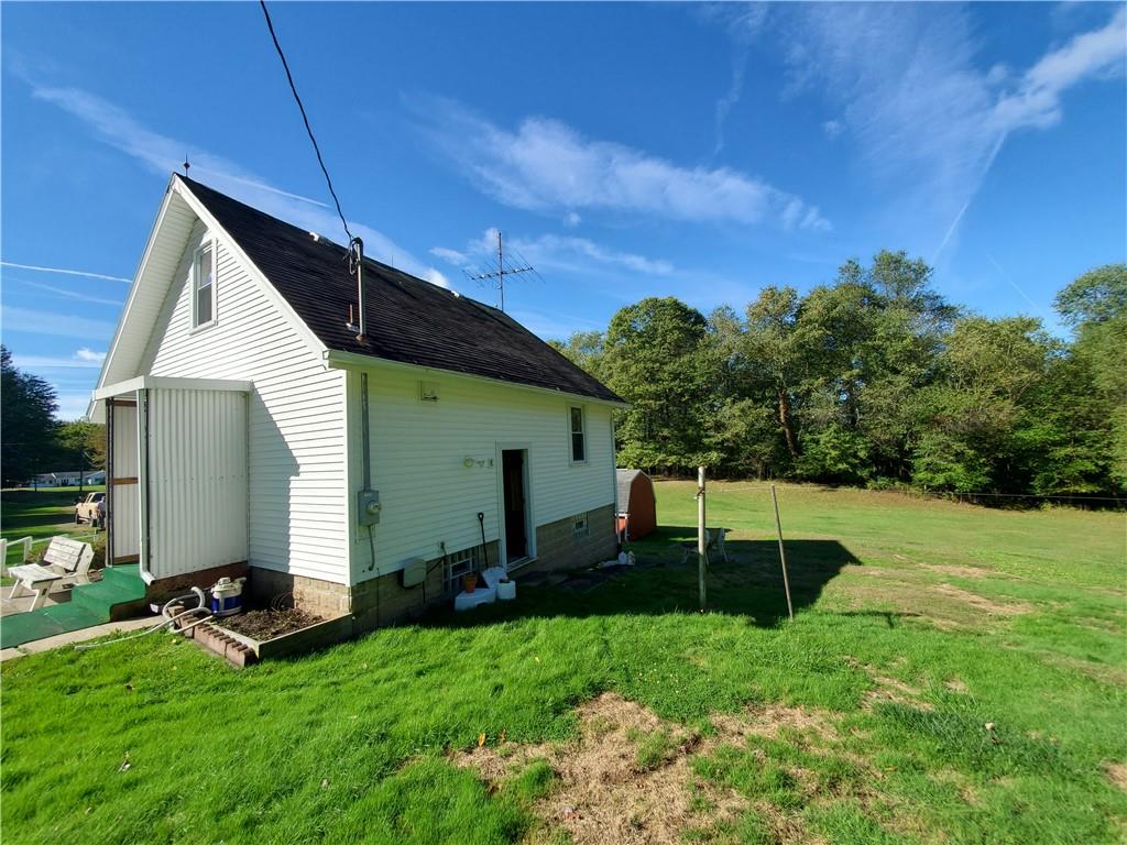 377 Fairview Road Fredonia, PA 16124 - Photo 3 of 27 a view of backyard with a garden and entertaining space