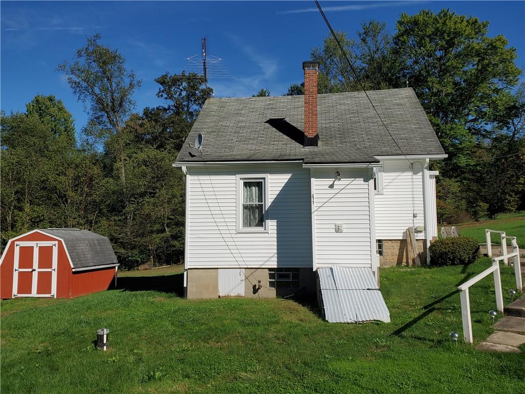 377 Fairview Road Fredonia, PA 16124 - Photo 4 of 27 a view of a house with backyard