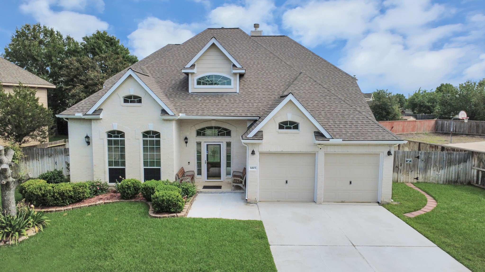 14103 Imperial Wood Lane Rosharon, TX 77583 - Photo 1 of 36 Charming front elevation with welcoming curb appeal and beautifully maintained landscaping