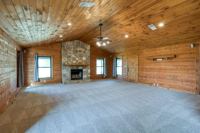 a view of a wooden door and a window