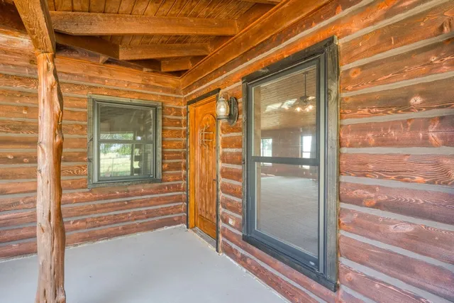 swimming pool view with sitting space and garden