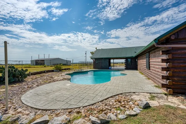 a view of backyard of house