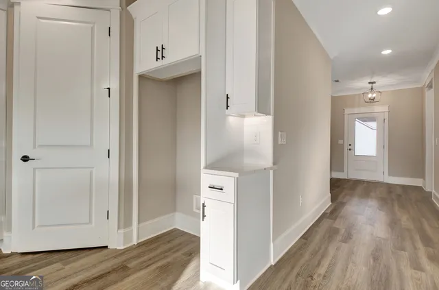 a view of a livingroom with wooden floor