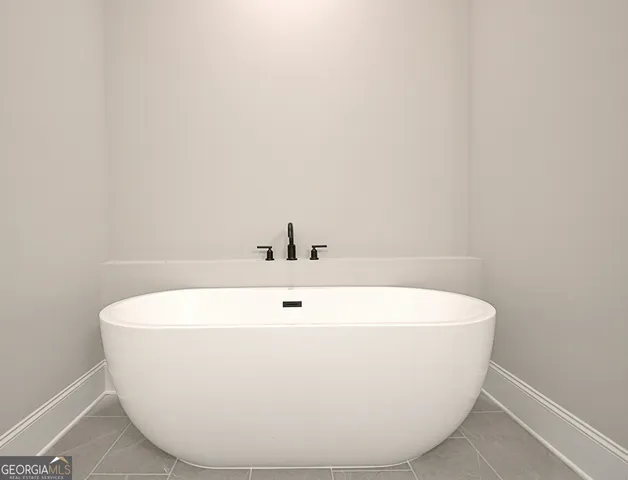 a bathroom with a sink vanity and mirror