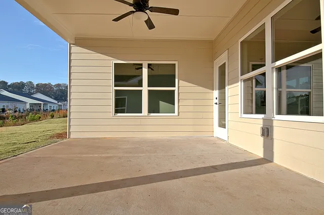a view of house with outdoor space area