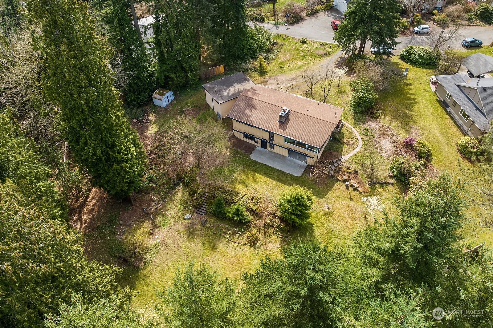 11004 Circle Drive Bothell, WA 98011 - Photo 1 of 14 an aerial view of house with yard swimming pool and outdoor seating