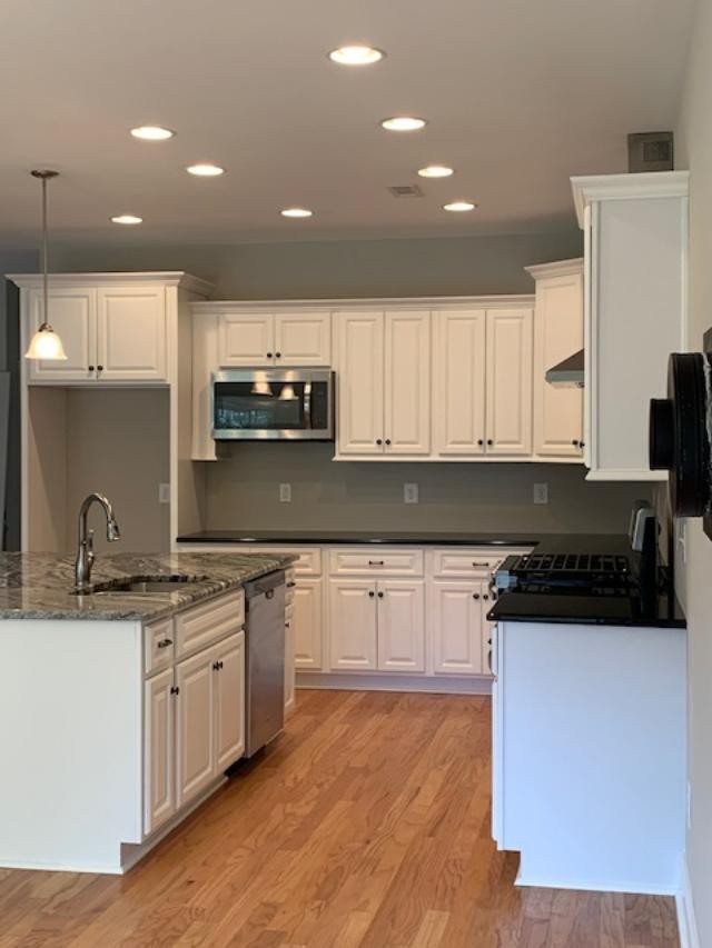 631 Ben Green Road Lebanon, TN 37090 - Photo 3 of 13 a kitchen with a sink stove and cabinets