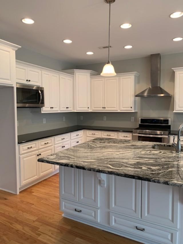 631 Ben Green Road Lebanon, TN 37090 - Photo 4 of 13 a kitchen with kitchen island granite countertop a sink a stove and cabinets