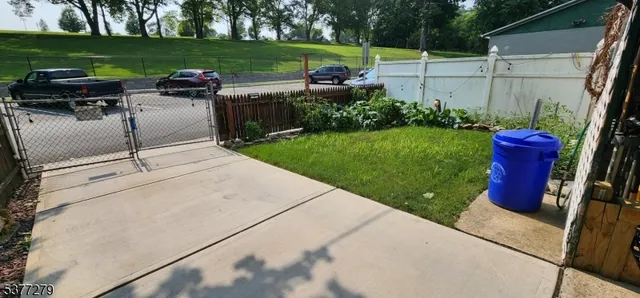 a view of a garden with an outdoor space