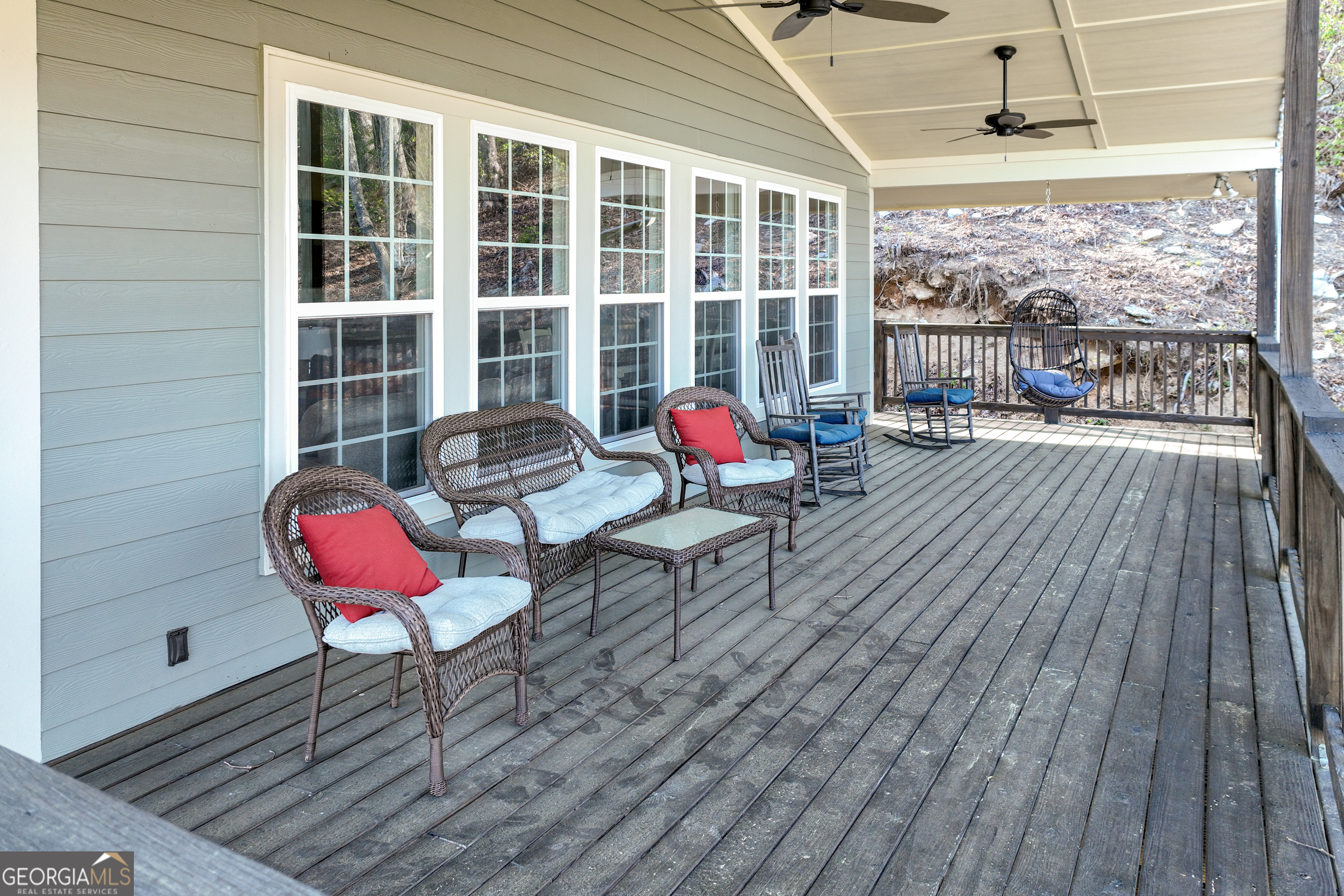 243 Degroff Lane Rabun Gap, GA 30568 - Photo 30 of 35 a living room with furniture and a window