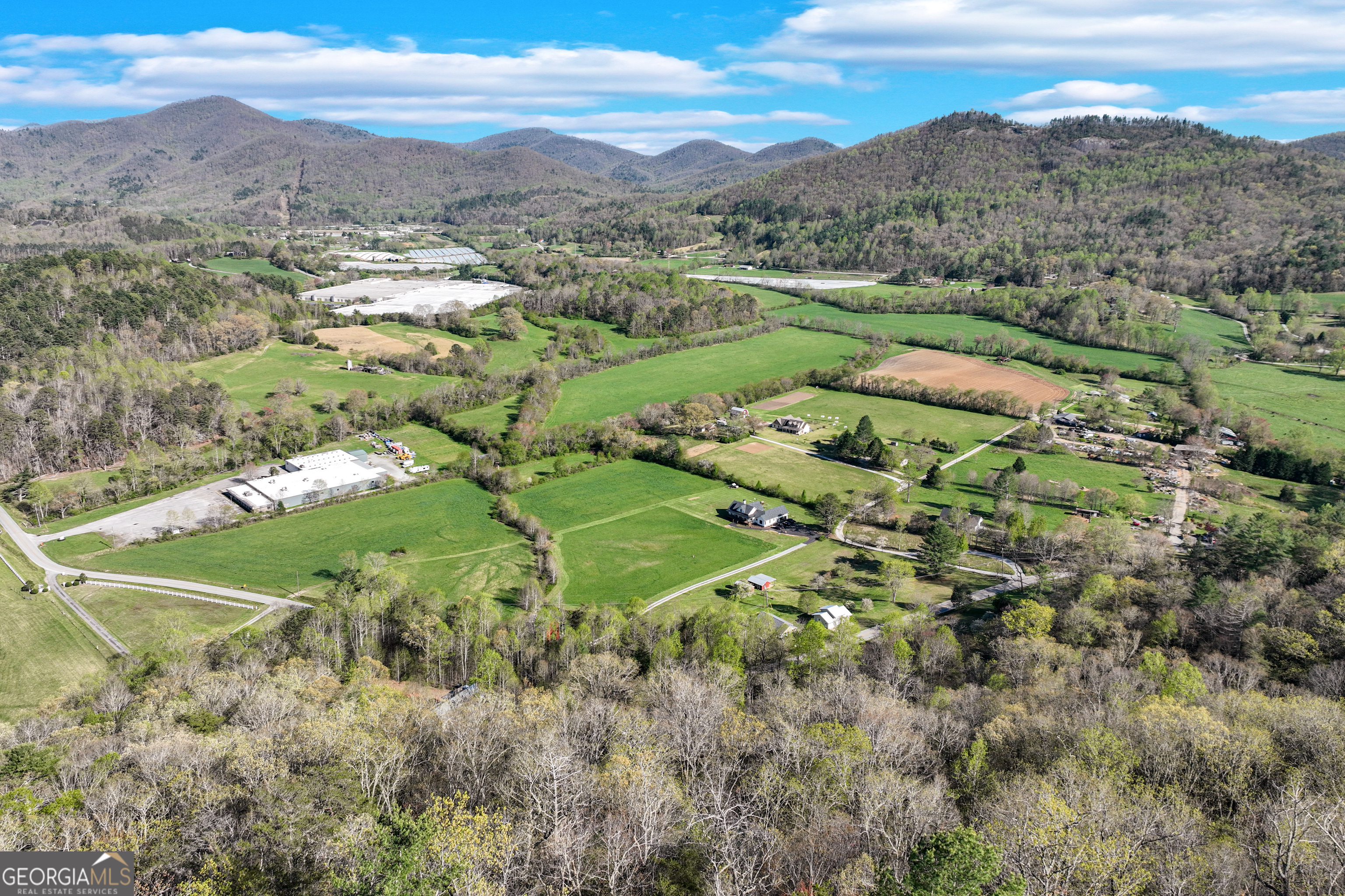 243 Degroff Lane Rabun Gap, GA 30568 - Photo 32 of 35 a view of a city with mountains in the background