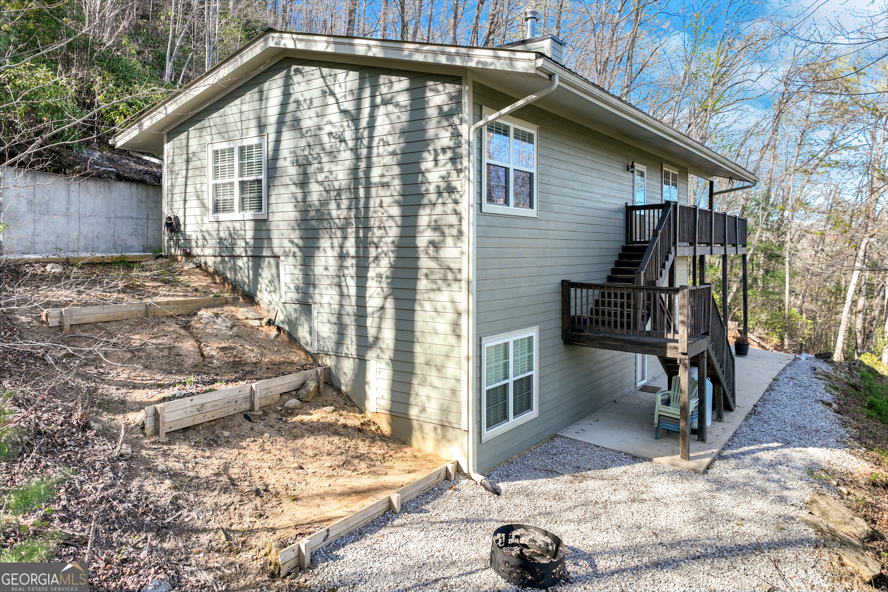 243 Degroff Lane Rabun Gap, GA 30568 - Photo 6 of 35 a front view of a house with a yard