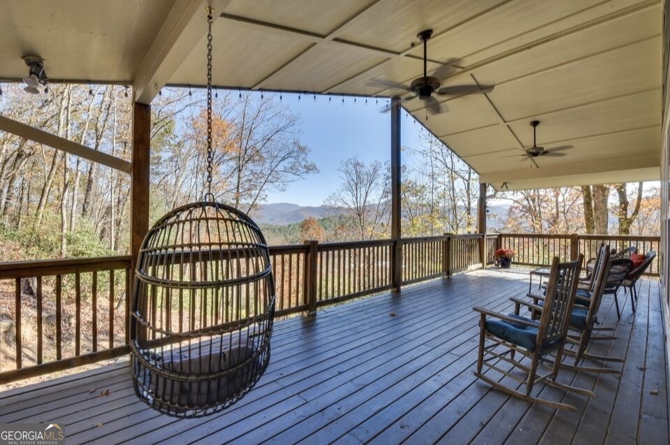 243 Degroff Lane Rabun Gap, GA 30568 - Photo 8 of 35 a view of balcony with wooden floor