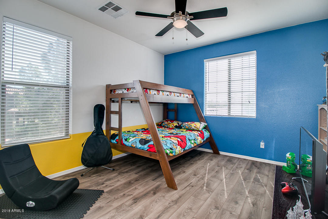 3954 East Morelos Street Gilbert, AZ 85295 - Photo 21 of 31 a bedroom with a bed and a tv