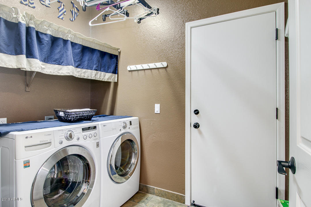 3954 East Morelos Street Gilbert, AZ 85295 - Photo 24 of 31 a utility room with dryer and washer