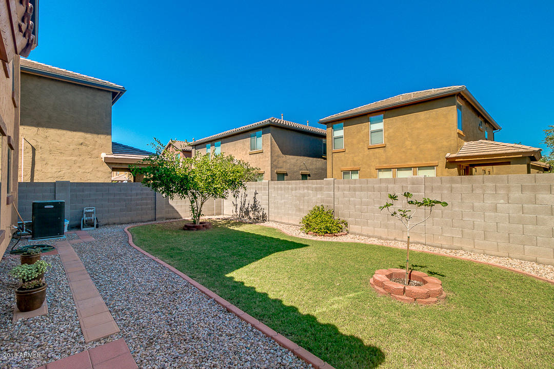 3954 East Morelos Street Gilbert, AZ 85295 - Photo 25 of 31 a front view of a house with a yard