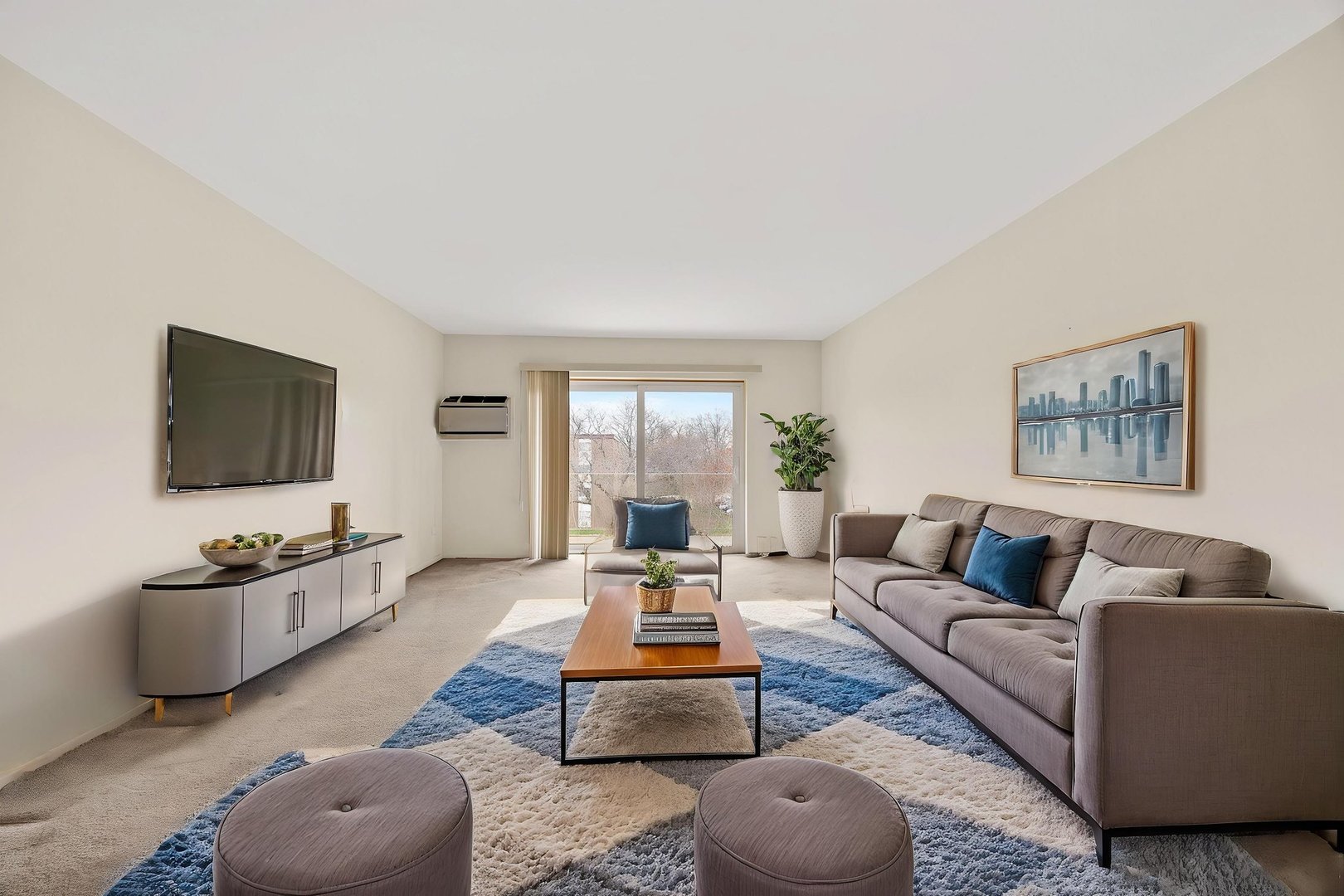 1321 South Finley Road, Unit 416 Lombard, IL 60148 - Photo 5 of 19 a living room with furniture and a flat screen tv