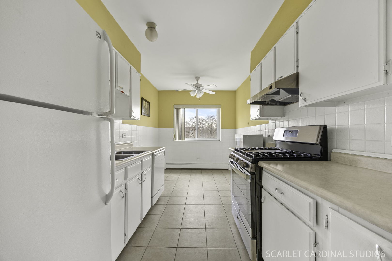 1321 South Finley Road, Unit 416 Lombard, IL 60148 - Photo 8 of 19 a kitchen with stainless steel appliances granite countertop a sink and a stove