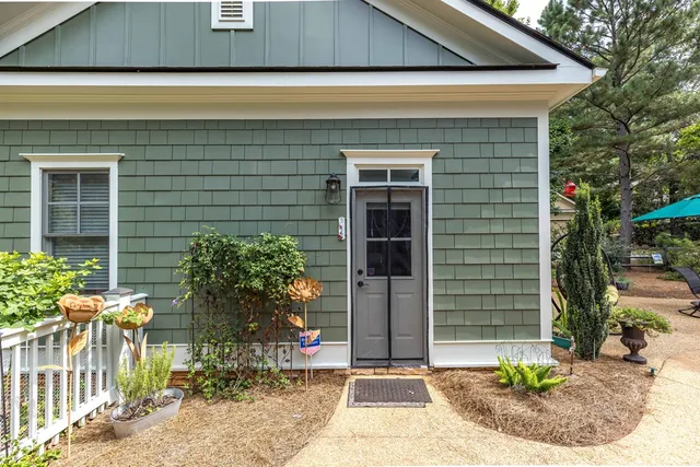 a bathroom with a tub sink and shower