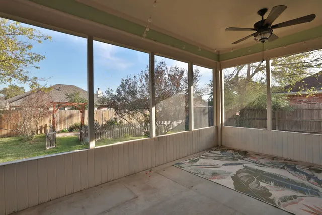 a view of a porch in front of a building