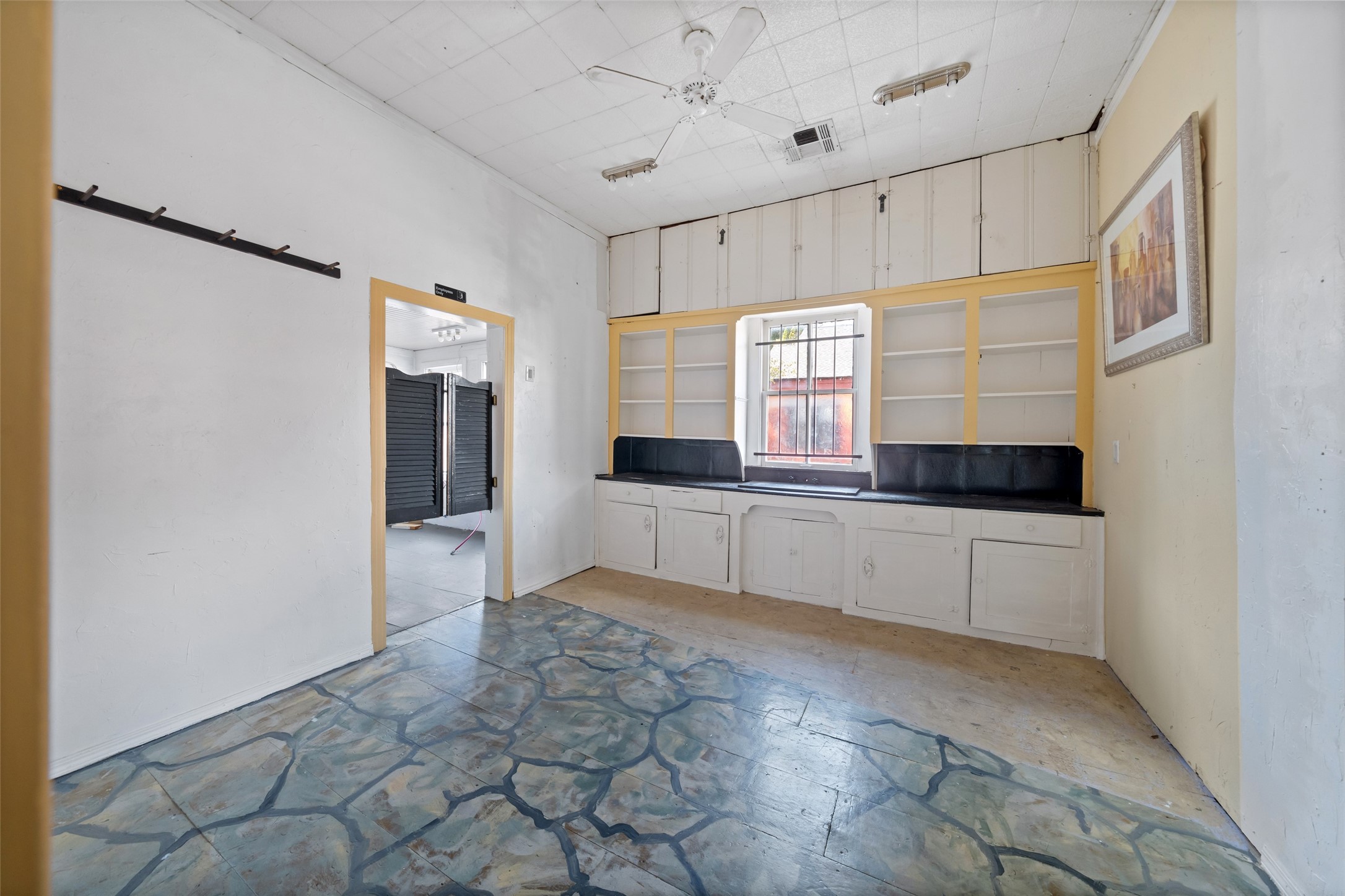 26407 Preston Avenue Spring, TX 77373 - Photo 11 of 38 a large white kitchen with granite countertop a stove a sink and a refrigerator