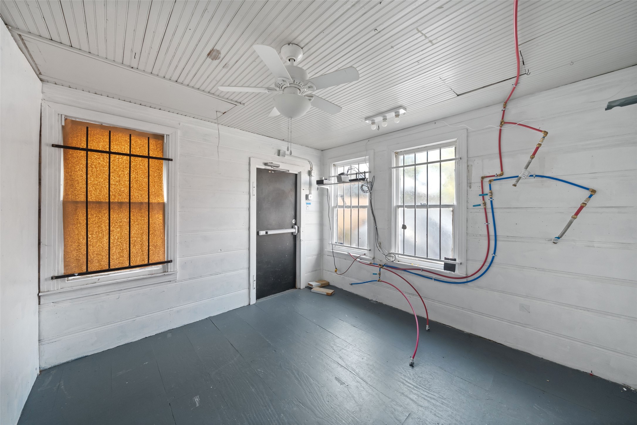 26407 Preston Avenue Spring, TX 77373 - Photo 12 of 38 a view of empty room with wooden floor and fan