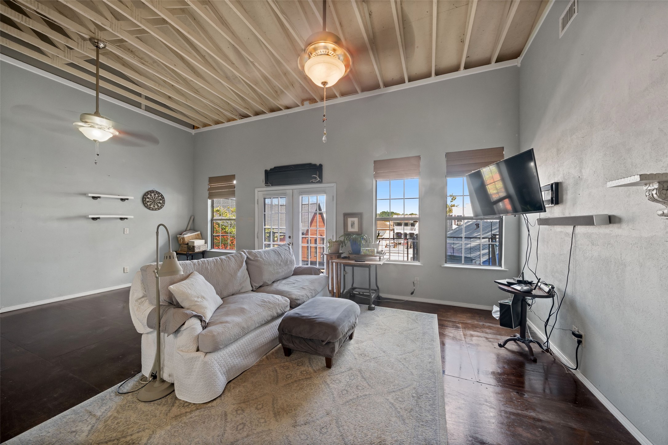 26407 Preston Avenue Spring, TX 77373 - Photo 19 of 38 a living room with furniture and a wooden floor