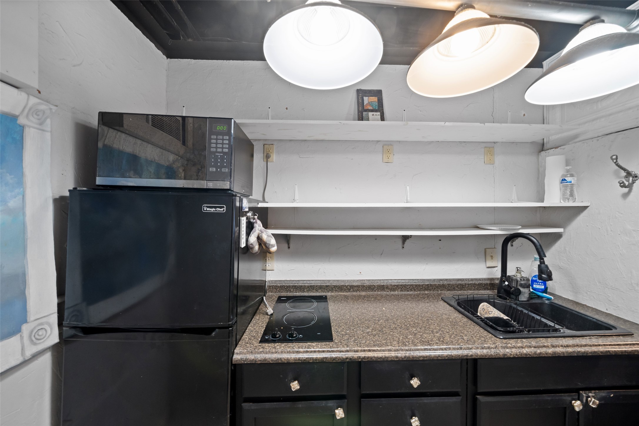 26407 Preston Avenue Spring, TX 77373 - Photo 27 of 38 a kitchen with a refrigerator and a stove