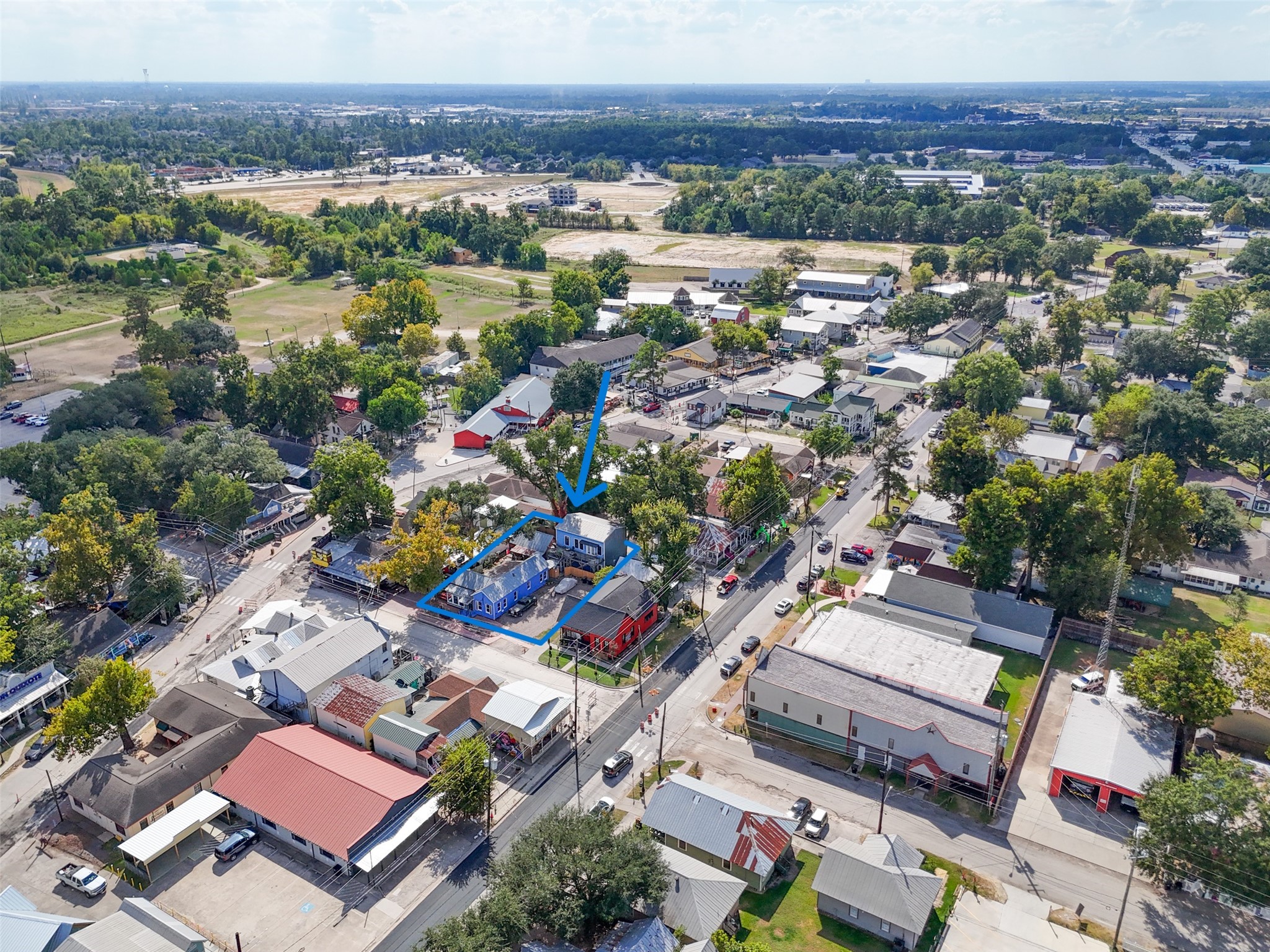 26407 Preston Avenue Spring, TX 77373 - Photo 35 of 38 an aerial view of a city with lots of residential buildings and mountain view in back