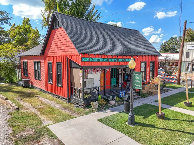 a view of swimming pool with sitting area