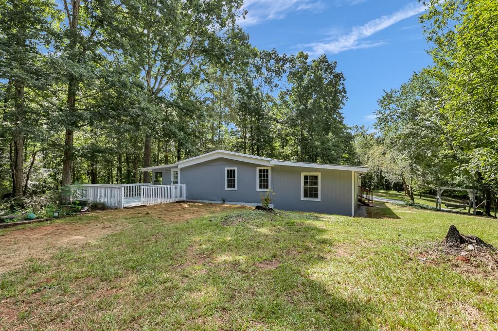 7564 Post Road Winston, GA 30187 - Photo 1 of 1 a view of a house with a yard