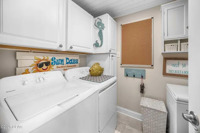 a view of a kitchen with kitchen island and windows