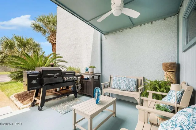 a living room with furniture and a piano