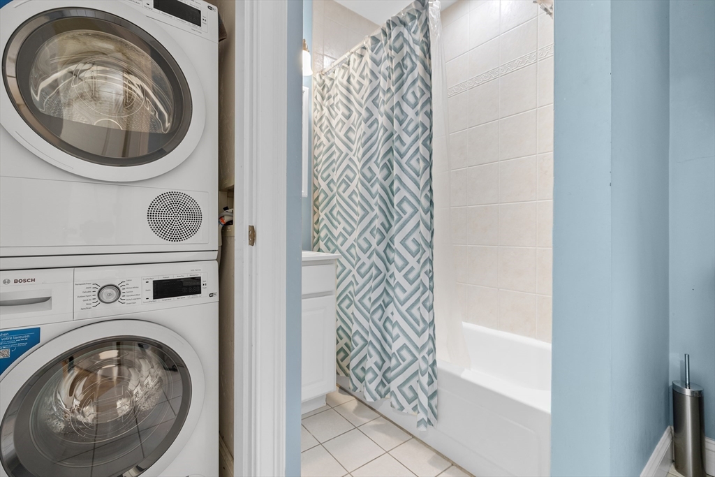 454 Hanover Street, Unit 5 Boston, MA 02113 - Photo 14 of 19 a utility room with dryer and washer