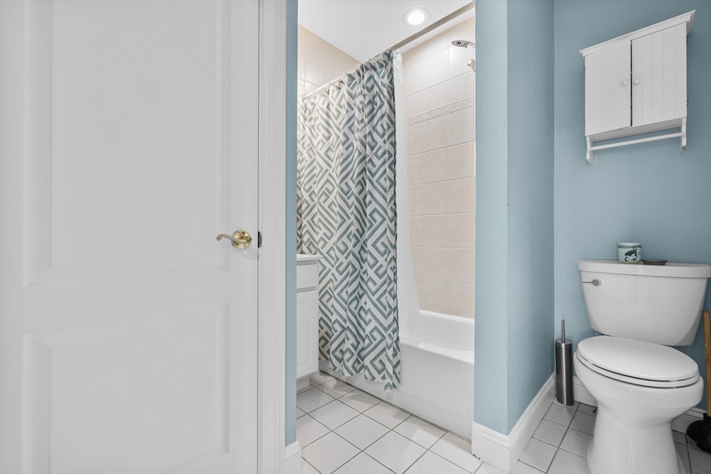 454 Hanover Street, Unit 5 Boston, MA 02113 - Photo 15 of 19 a bathroom with a toilet and shower