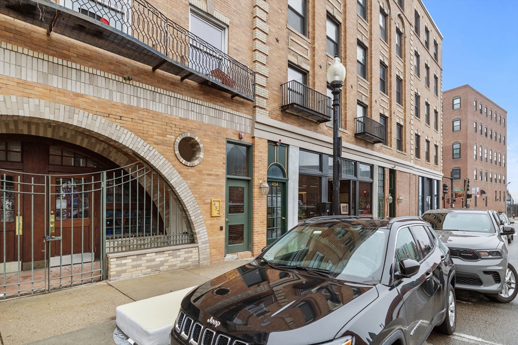 454 Hanover Street, Unit 5 Boston, MA 02113 - Photo 18 of 19 a view of a car park in front of building