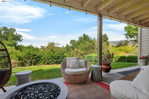 a view of a patio with backyard