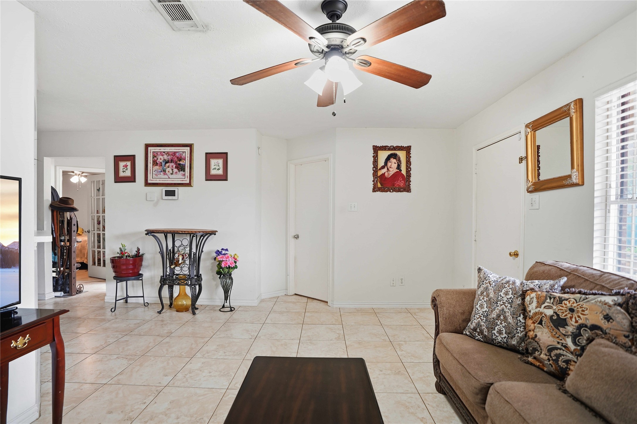 15258 Ferness Lane Channelview, TX 77530 - Photo 6 of 16 a living room with furniture and a couch