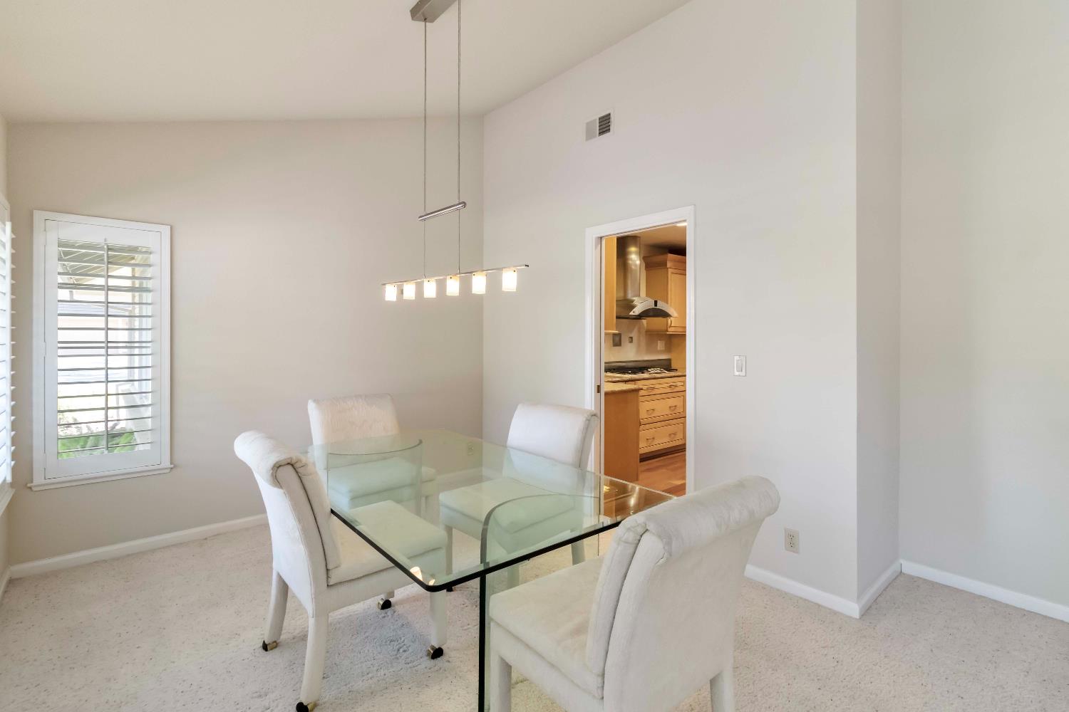 1311 Aberdeen Circle Granite Bay, CA 95746 - Photo 11 of 50 a view of a dining room with furniture and wooden floor