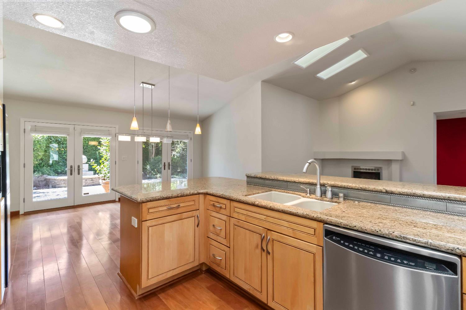 1311 Aberdeen Circle Granite Bay, CA 95746 - Photo 18 of 50 a kitchen with granite countertop a sink and stove top oven