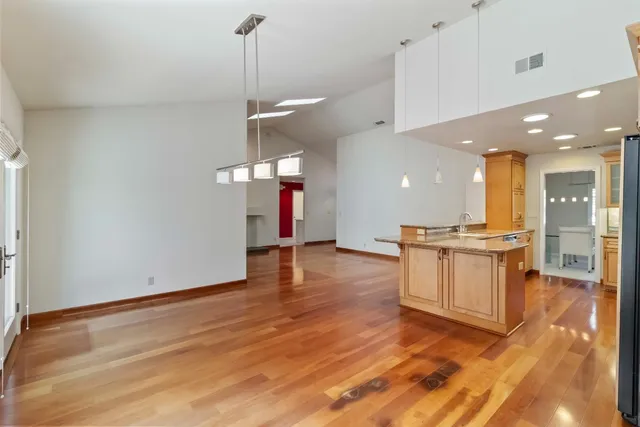 a view of a kitchen with a sink