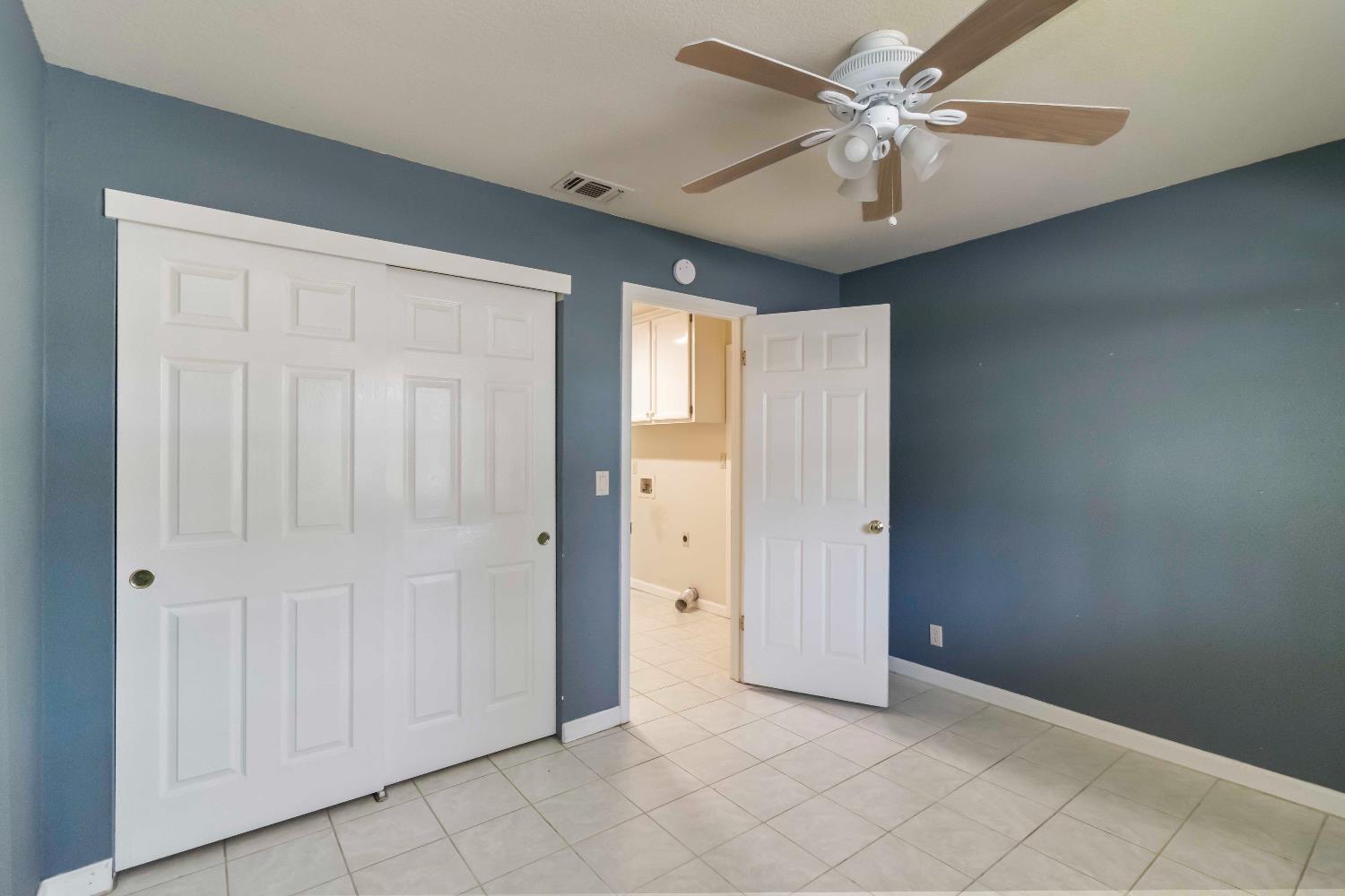 1311 Aberdeen Circle Granite Bay, CA 95746 - Photo 29 of 50 an empty room with fan and windows