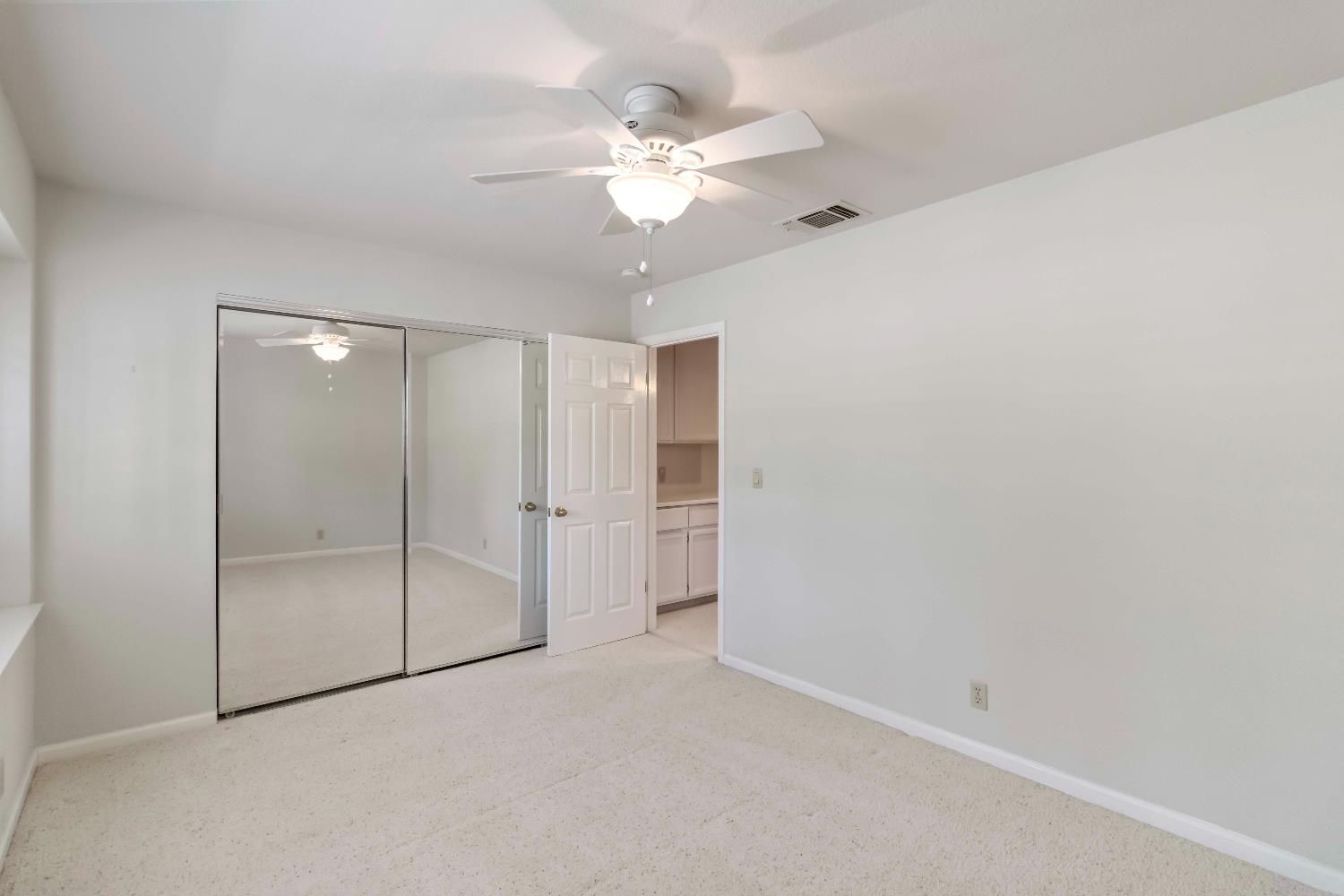 1311 Aberdeen Circle Granite Bay, CA 95746 - Photo 34 of 50 a view of an empty room with a fan