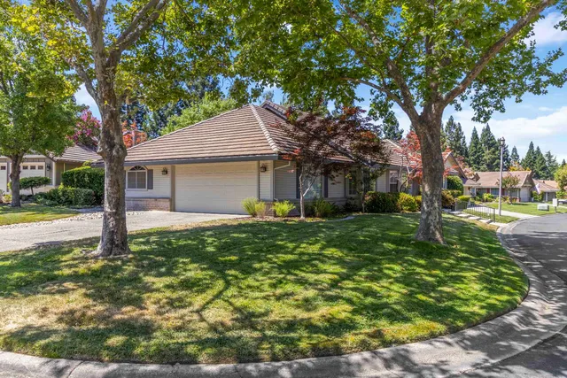 a house view with a garden space