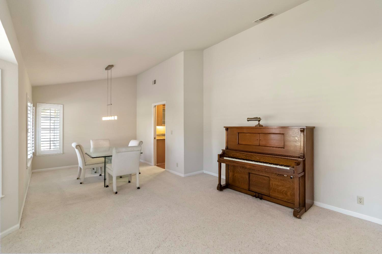 1311 Aberdeen Circle Granite Bay, CA 95746 - Photo 10 of 50 a living room with furniture and a piano